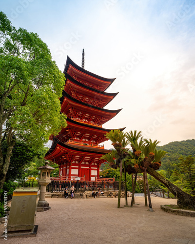 Toyokuni shrine five-story pagoda, stands on a hill near the Honden front shrine of Itsukushima Shrine. photo