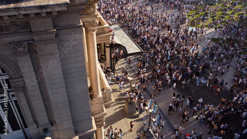 Crowd in Buenos Aires streets. Argentinian people celebrating in park. 