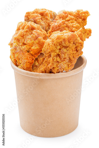 Nugget Fried chicken isolated on paper bucket With clipping path, Fried chicken on white.