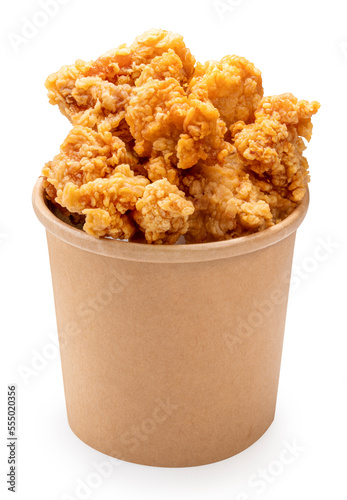 Nugget Fried chicken isolated on paper bucket With clipping path, Fried chicken on white.