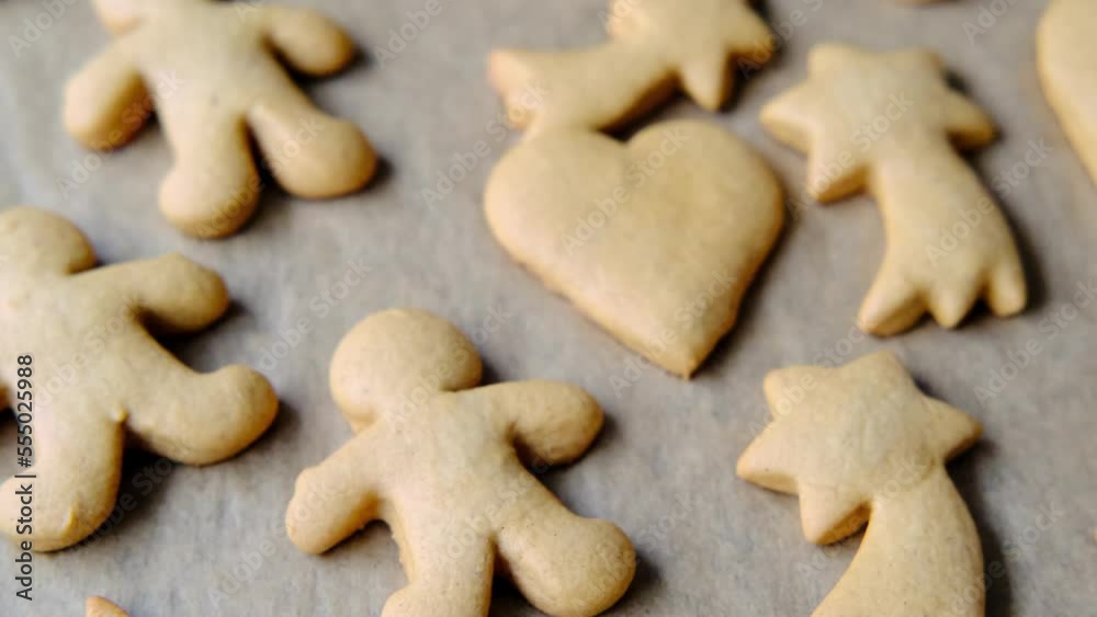 ready-baked ginger cookies on a baking sheet.