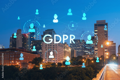 Panoramic view of Broadway district of Nashville over Cumberland River at illuminated night skyline, Tennessee, USA. GDPR hologram, concept of data protection regulation and privacy for individuals