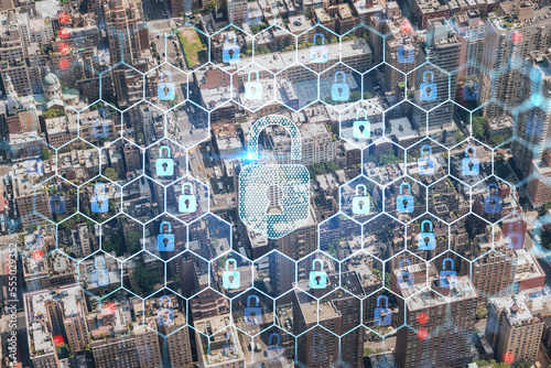Aerial top view of New York City building roofs. Bird's eye view from helicopter of metropolis cityscape. The concept of cyber security to protect confidential information, padlock hologram