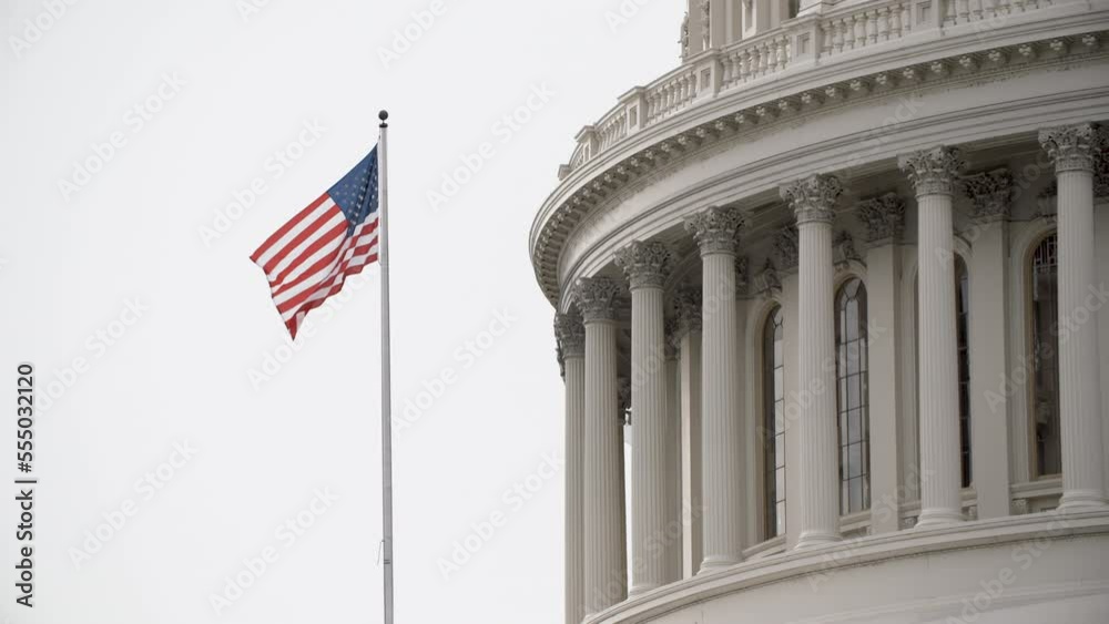Flag Waving on U.S. Capitol Building in Washington, D.C.