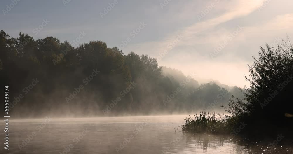 A little fog on the river in the autumn season A little fog on the river in the autumn season