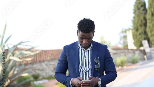 Portrait of young ethnic male manager