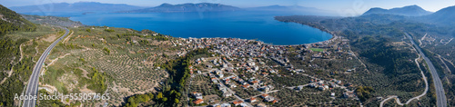 Aerial view of the village Agios Konstantinos in Greece on a sunny day. © GDMpro S.R.O