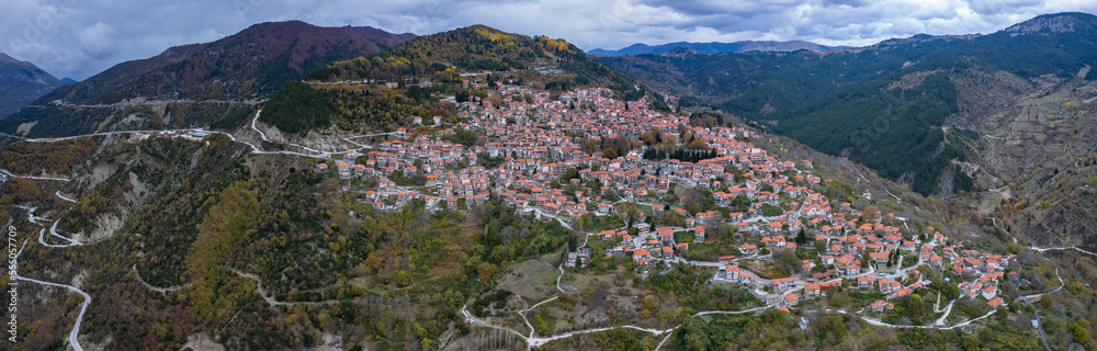 Aerial view around the mountain village Metsovo in Greece on an overcast afternoon in autumn