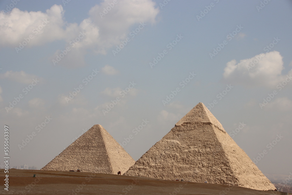 The Pyramid of Khafre and the Great Pyramid of Khufu, Giza Pyramids complex, Cairo, Egypt. The Pyramid of Khafre and the Great Pyramid of Khufu, Giza Pyramids complex, Cairo, Egypt.