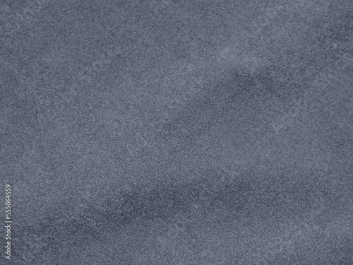 Greyish color velvet fabric texture used as background. blond color fabric background of soft and smooth Grey textile material ,Winter sea. There is space for text.