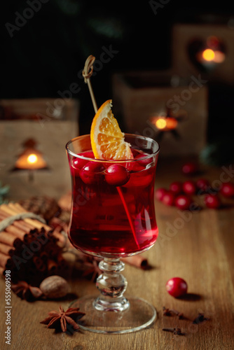 Christmas drink with spices  orange  and cranberries.