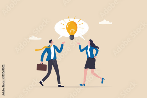 Communicate idea in business discussion, effective communication to brainstorm and come up with solution or result concept, businessman and woman coworker talking speech bubble with lightbulb idea. © Nuthawut