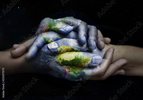 Earth overlay, holding hands and sustainability support of people with global love and empathy. Sustainable, green and hands together for international help, eco friendly trust and ecology helping