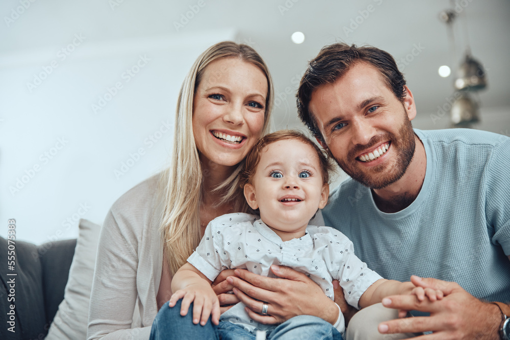 Family, happy portrait and relax with baby on sofa in living room for love, support and quality time bonding. Parents smile, holding kid and happiness together for trust on couch in family home