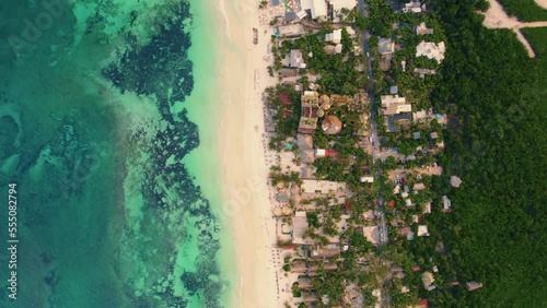 Drone top shot of Akiin Beach with turquoise colour, Tulum, Mexico photo