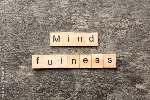 mind fulness word written on wood block. mind fulness text on table, concept photo