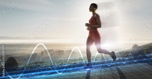 Heart rate hologram, running and black woman on mountains with healthy breath technology. Digital light, woman and runner on a mountain road with training, exercise and health wellness outdoor