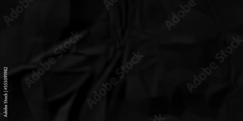 Dark Black facbric paper backdrop crumpled texture. dark black textured crumpled black paper background. panorama black paper texture background, crumpled pattern.