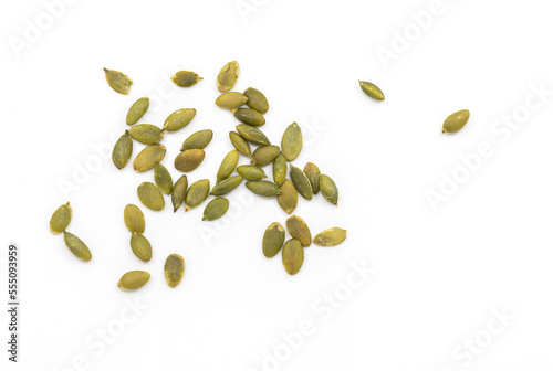 Isolated pumpkin seeds on white background, close-up pumpkin seeds, top view image.