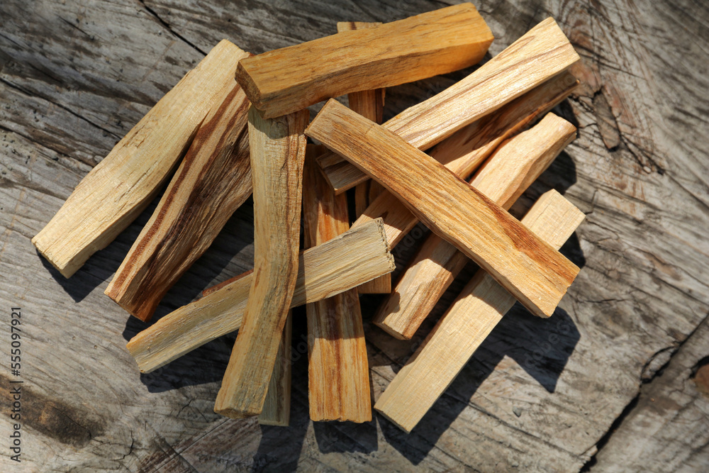 Palo santo sticks on wooden table, top view Palo santo sticks on wooden table, top view