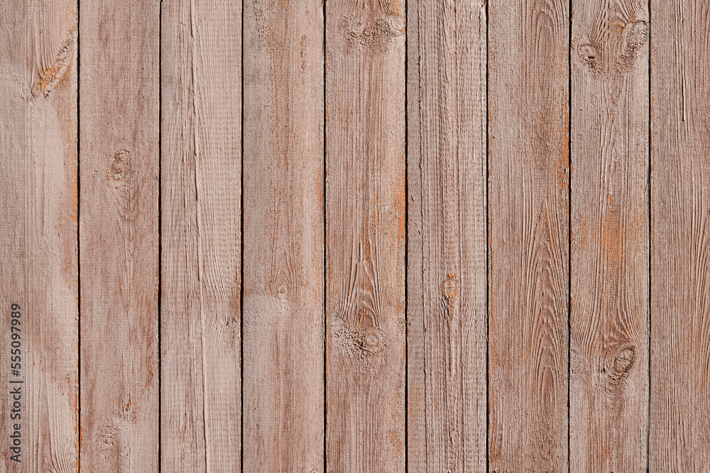 Texture of a brown wooden background made of boards Texture of a brown wooden background made of boards