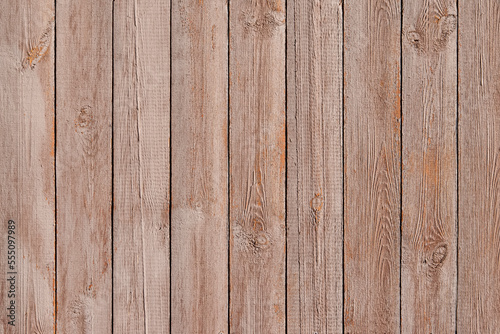 Texture of a brown wooden background made of boards
