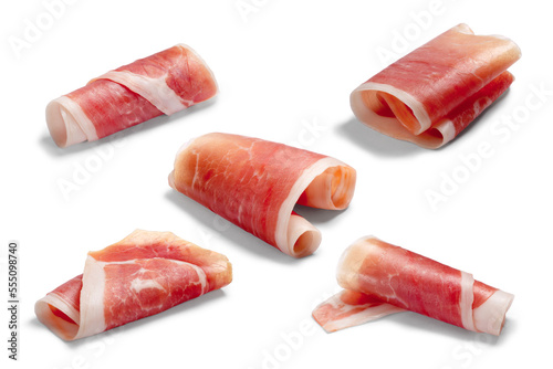 Jamon, Prosciutto, Speck, Dry Cured Meat or Ham slice, rolled up isolated png photo