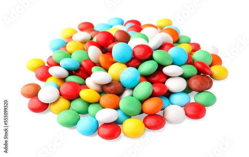 Many small colorful candies on white background