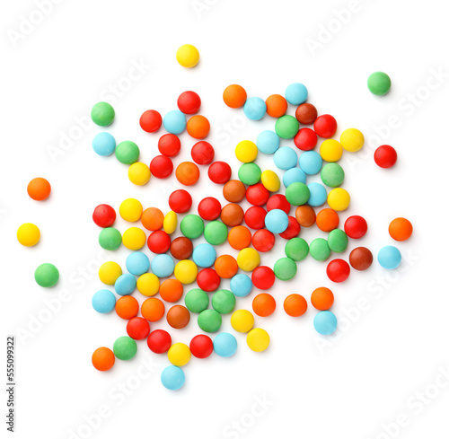 Many small colorful candies on white background, top view