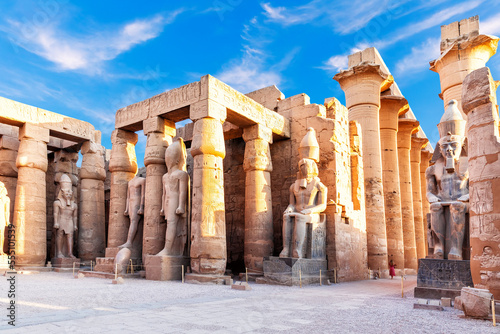 Obraz na płótnie Beautiful Luxor temple, first pylon ruins near the statues of Ramses II, Egypt w salonie