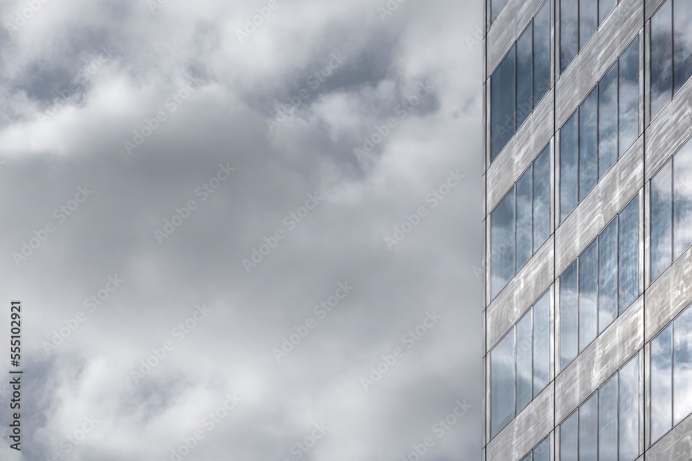 Reflections in mirrored facade in a modern building Reflections in mirrored facade in a modern building