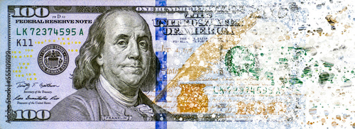 hundred dollars bill disintegration on a white background photo