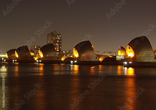 Thames Barrier lit up at night