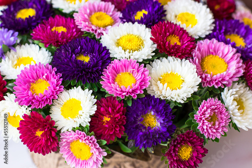 Bright cute bouquet of chrysanthemums. Bouquet on a white background