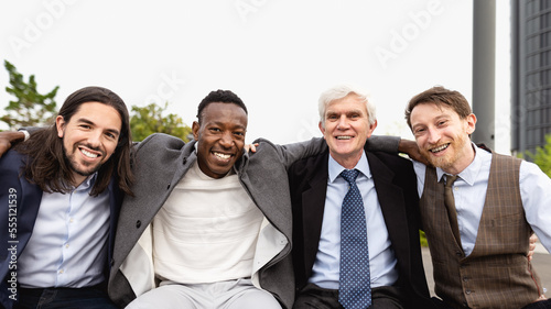 Fototapeta Naklejka Na Ścianę i Meble -  Team of multiracial business people with different ages and ethnicities standing in the city center during meeting work