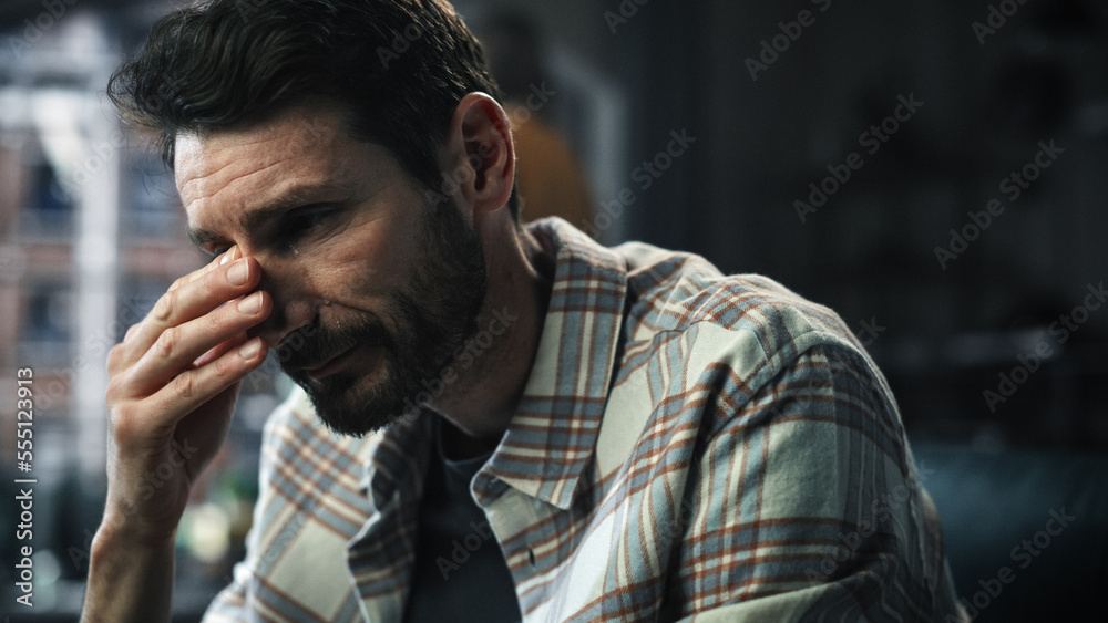 Dark Gloomy Portrait of Fragile Emotional man Crying being Bullied by Partner. Couple Arguing and Fighting Violently. Domestic Violence, Emotional Abuse. Rack Focus with Girfriend Screaming Dark Gloomy Portrait of Fragile Emotional man Crying being Bullied by Partner. Couple Arguing and Fighting Violently. Domestic Violence, Emotional Abuse. Rack Focus with Girfriend Screaming