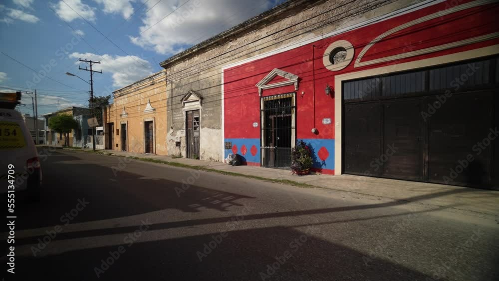 Slow motion push in down a deserted street in Mexico, Merida, Yucatan in early evening. Slow motion push in down a deserted street in Mexico, Merida, Yucatan in early evening.
