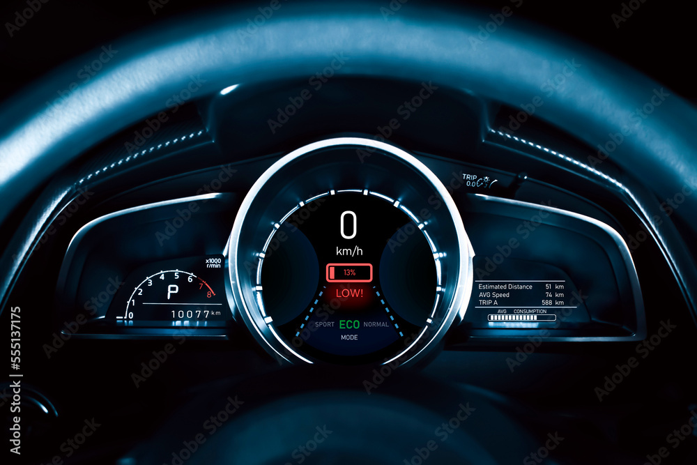 Low battery warning light on instrument panel of EV electric vehicle, Alternative energy concept of saving the world