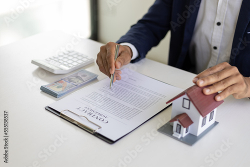Legal real estate agent contract agreement, lease, mortgage, rental, home insurance concept.