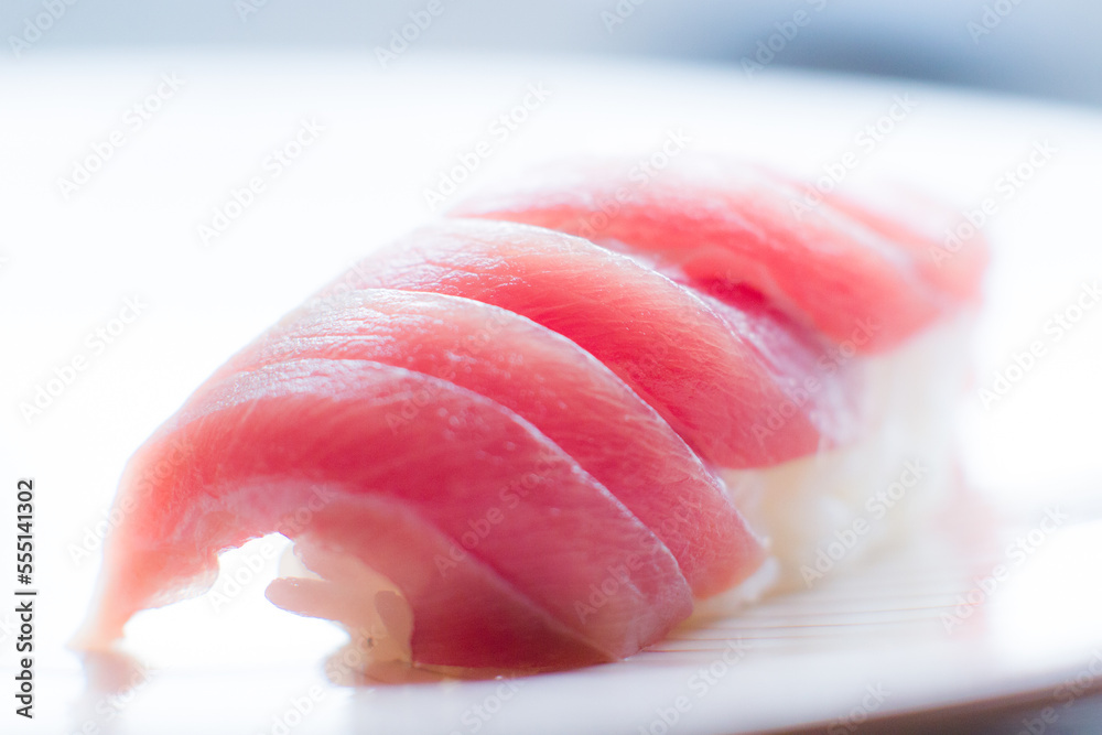 Tuna nigiri in Japanese restaurant. Fish combination.