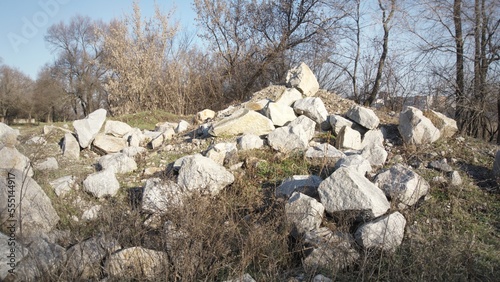 large polished stones in the park, huge, decorative, gray