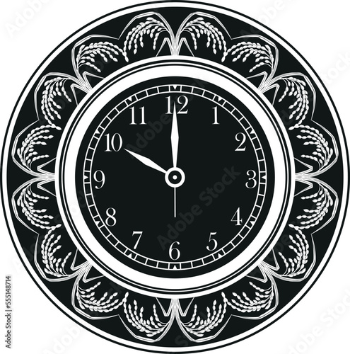 Clock with floral frame.