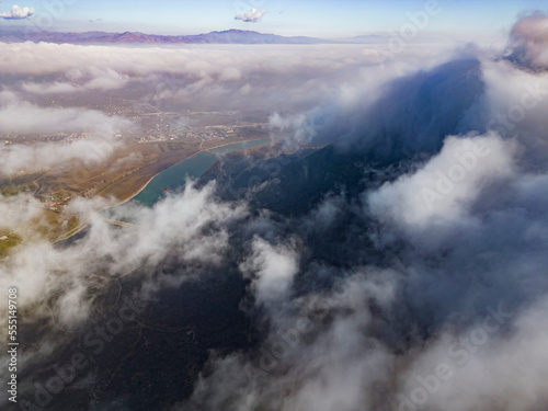 Enormous and mysterious misty views of the city from the peaks of the mountains