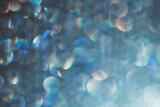 Abstract blue background with glitter bokeh