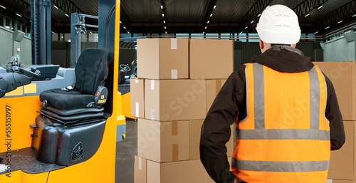Customs warehouse worker. Male inspector has his back to camera. Customs inspector examines boxes. Customs officer inside warehouse hangar. Fragment of forklift near storekeepers man. 3d image.