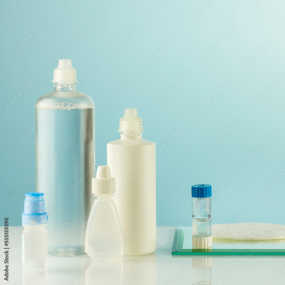 Oftalmology concept with container with contact lenses, moisturizing