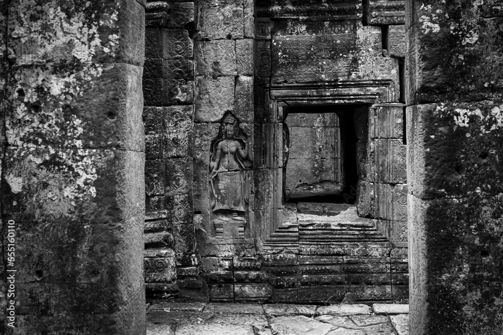Monochrome bas-relief of crowned woman beside window, Banteay Kdei, Angkor Wat; Siem Reap, Siem Reap Province, Cambodia Monochrome bas-relief of crowned woman beside window, Banteay Kdei, Angkor Wat; Siem Reap, Siem Reap Province, Cambodia