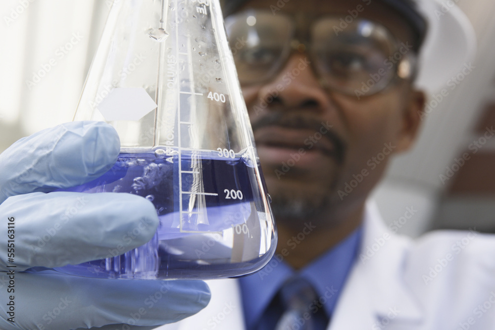 Scientist experimenting with a water sample Scientist experimenting with a water sample