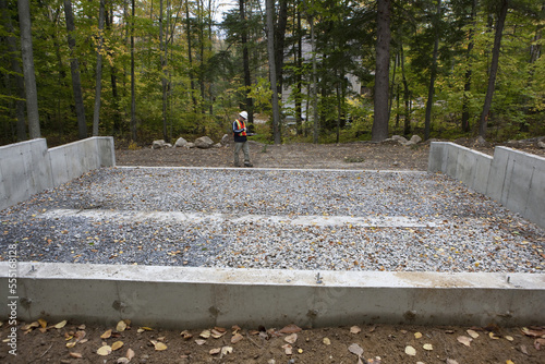 Engineer examining a construction site photo