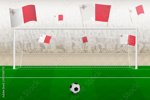 Malta football team fans with flags of Malta cheering on stadium, penalty kick concept in a soccer match.